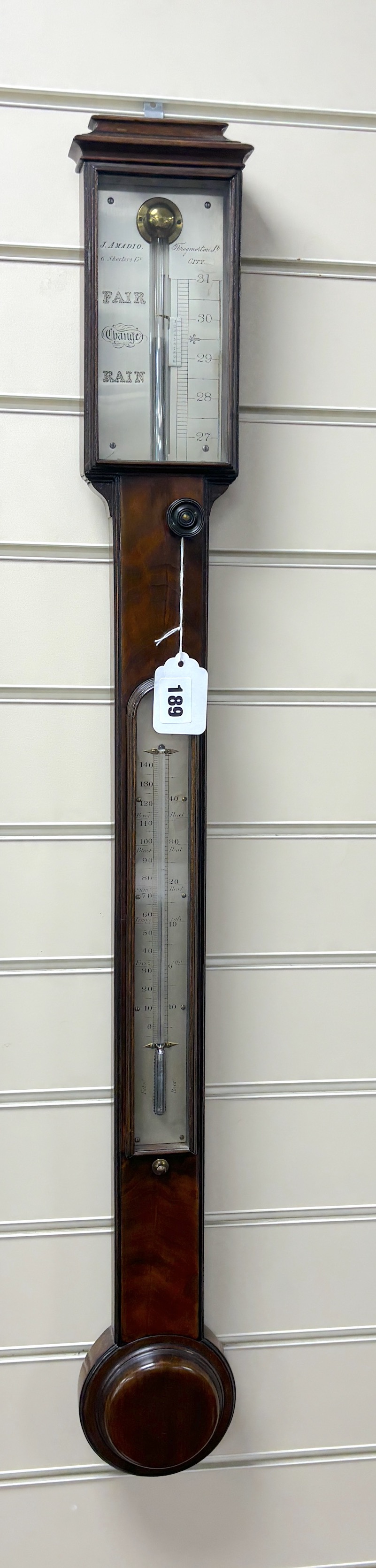 A George III mahogany stick barometer, by T. Amadio, height 94cm